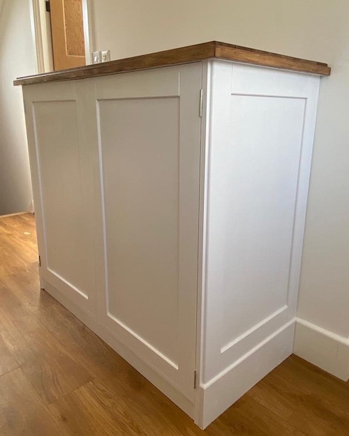 Bespoke timber cupboard painted white